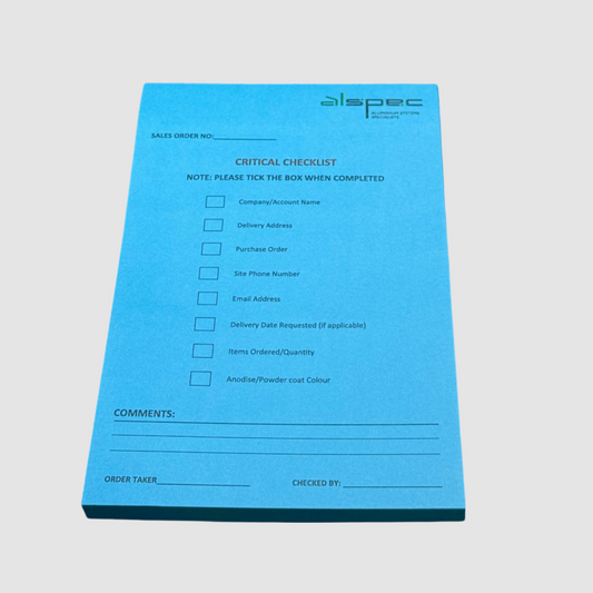 This image showcases a custom checklist notepad featuring a critical checklist design. It's personalised with a company logo and essential fields for tracking orders, delivery details, and more. The bold blue colour enhances visibility and makes it ideal for workplace efficiency and branding. Perfect for industries prioritising organisation and clear communication.